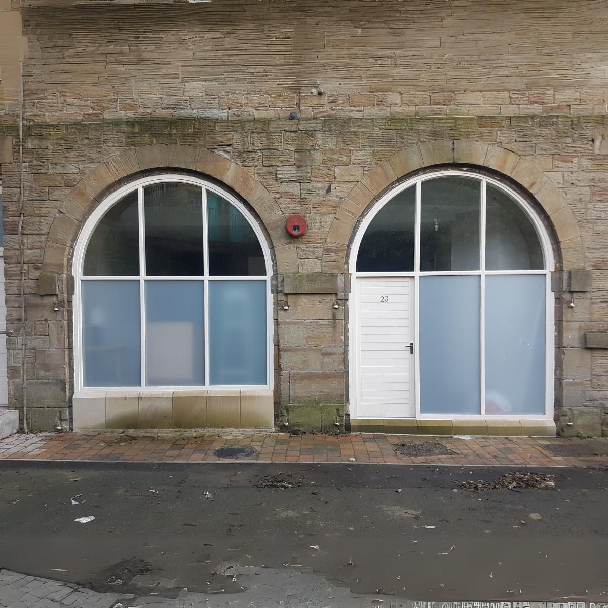 Yorkshire stone cottage with Farrar Joinery timber windows and entrance door